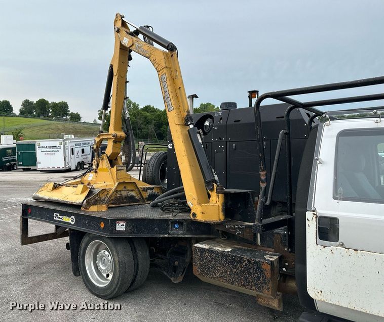 image for item DO5115 2015 Ford F550 Super Duty  flatbed truck with side boom mower