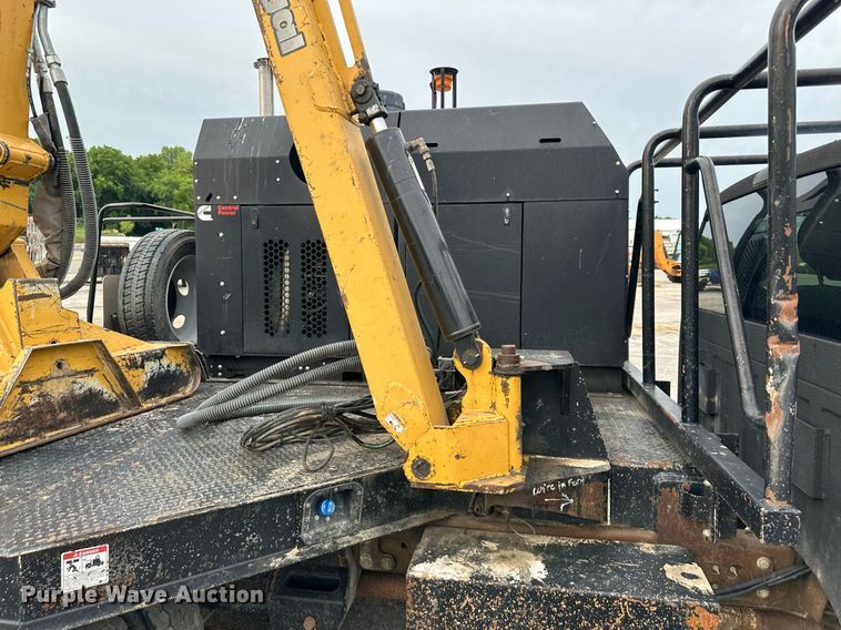 image for item DO5115 2015 Ford F550 Super Duty  flatbed truck with side boom mower