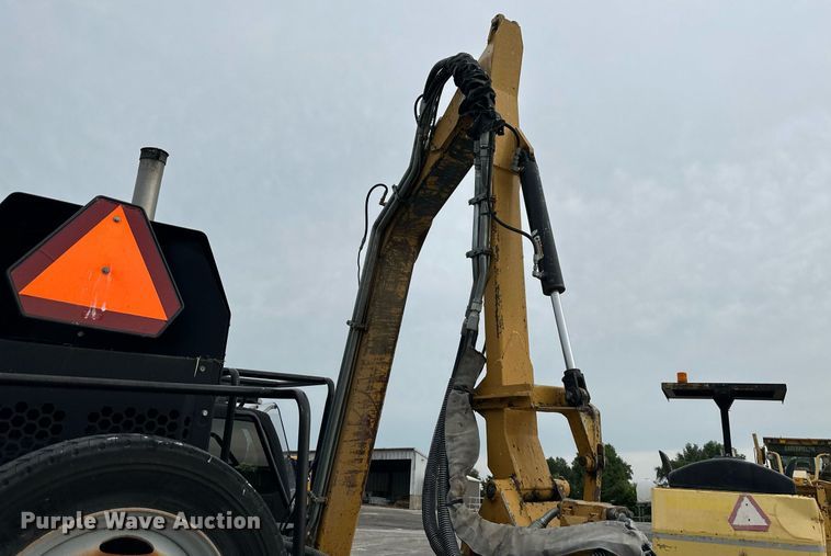 image for item DO5115 2015 Ford F550 Super Duty  flatbed truck with side boom mower