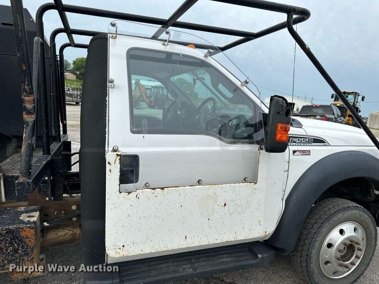 image for item DO5115 2015 Ford F550 Super Duty  flatbed truck with side boom mower