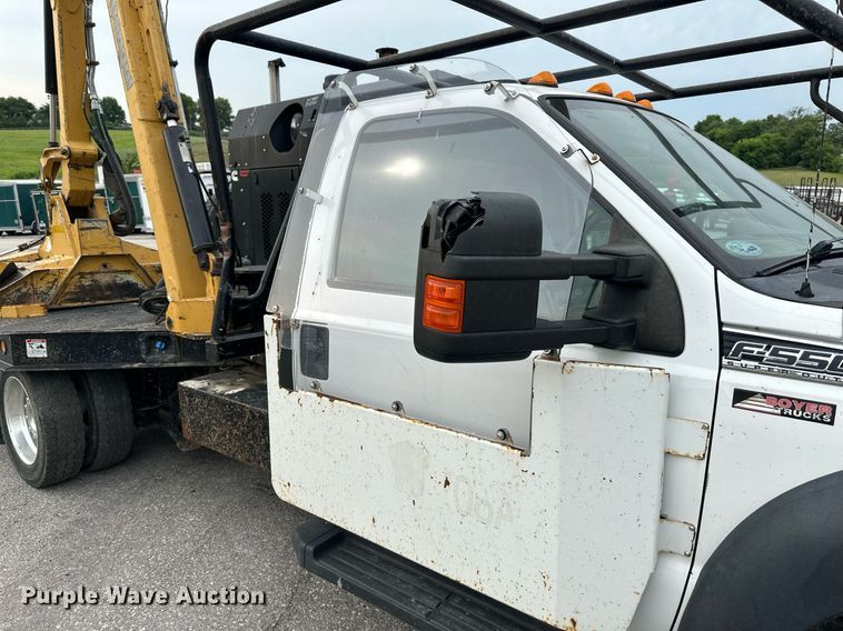 image for item DO5115 2015 Ford F550 Super Duty  flatbed truck with side boom mower