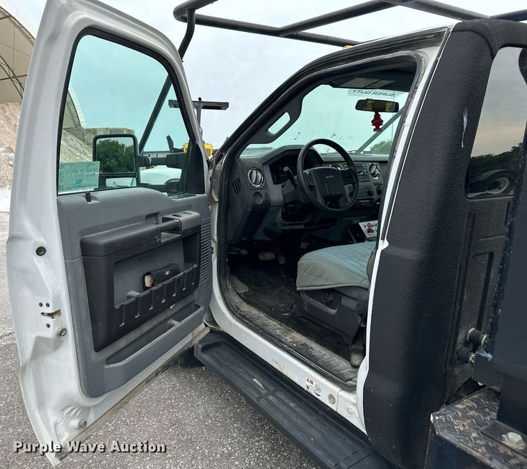 image for item DO5115 2015 Ford F550 Super Duty  flatbed truck with side boom mower