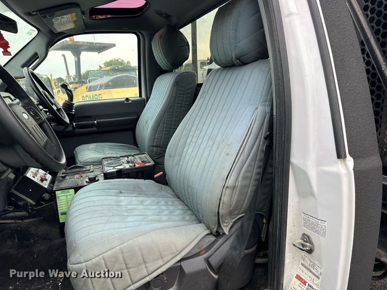 image for item DO5115 2015 Ford F550 Super Duty  flatbed truck with side boom mower