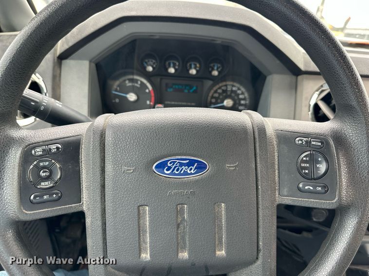 image for item DO5115 2015 Ford F550 Super Duty  flatbed truck with side boom mower