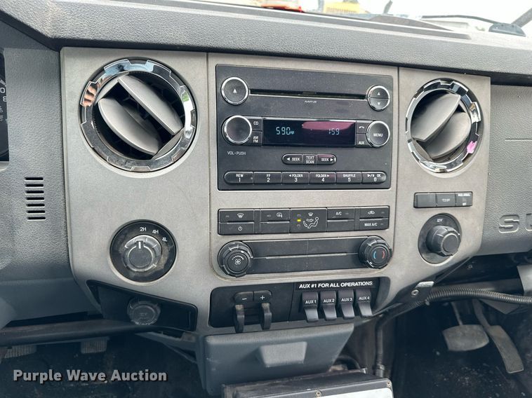 image for item DO5115 2015 Ford F550 Super Duty  flatbed truck with side boom mower