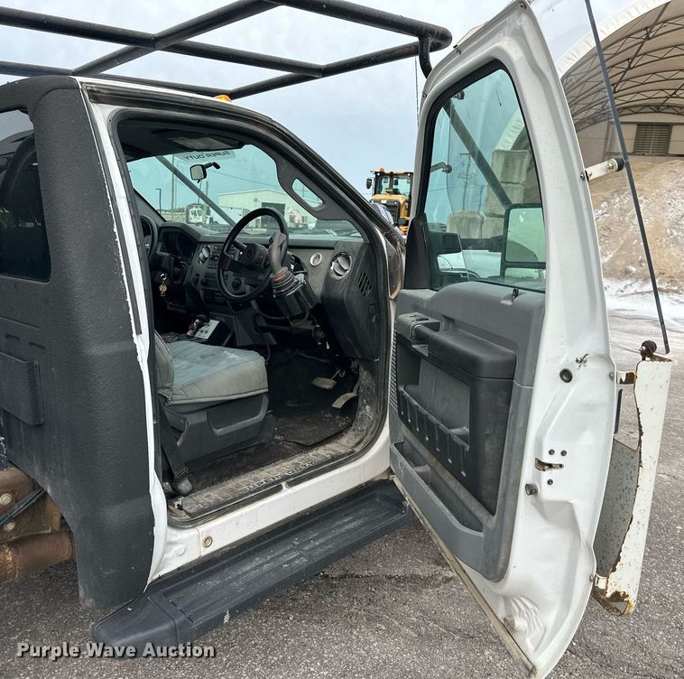 image for item DO5115 2015 Ford F550 Super Duty  flatbed truck with side boom mower