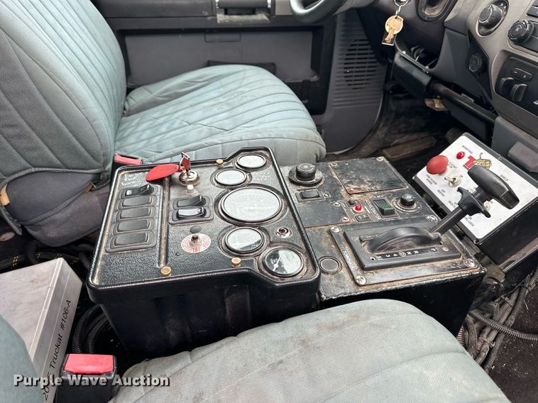 image for item DO5115 2015 Ford F550 Super Duty  flatbed truck with side boom mower