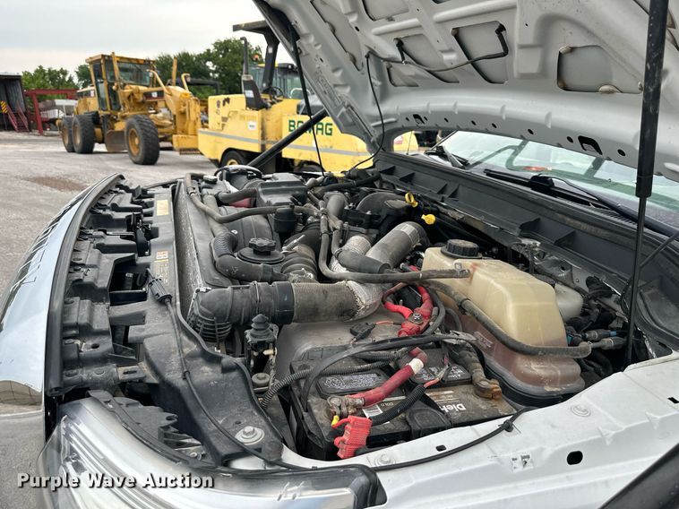 image for item DO5115 2015 Ford F550 Super Duty  flatbed truck with side boom mower