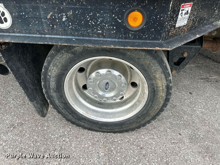 image for item DO5115 2015 Ford F550 Super Duty  flatbed truck with side boom mower