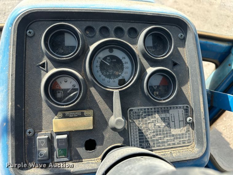 image for item NE9076 1984 Ford 7710  MFWD tractor