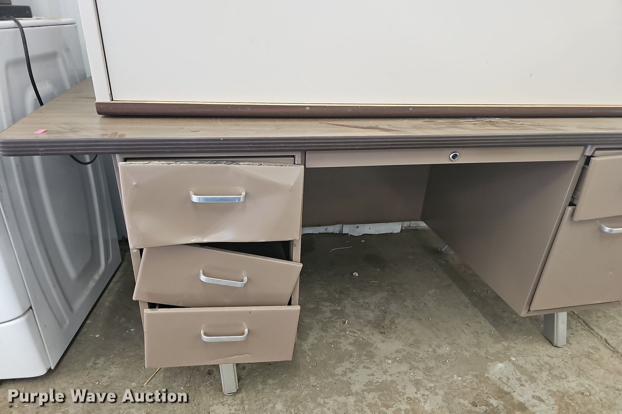 (2) office desks in Lebanon, MO Item NT9740 sold Purple Wave