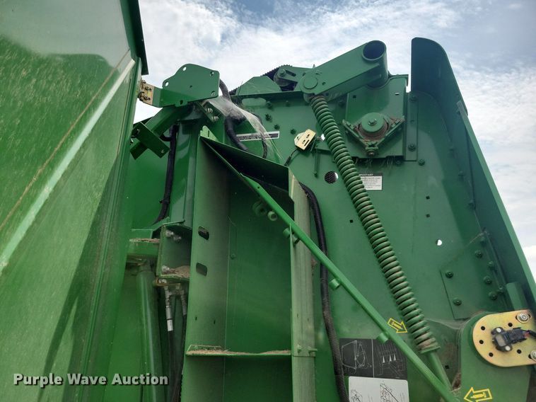 image for item DN4008 John Deere 569 Mega Wide Plus  round baler