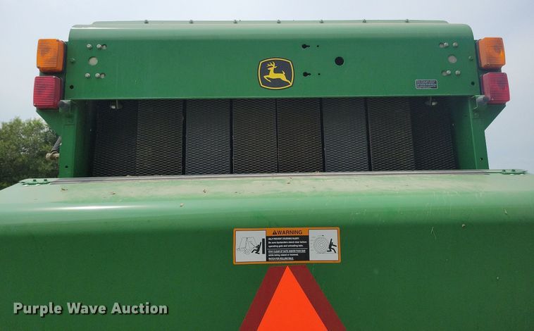 image for item DN4008 John Deere 569 Mega Wide Plus  round baler