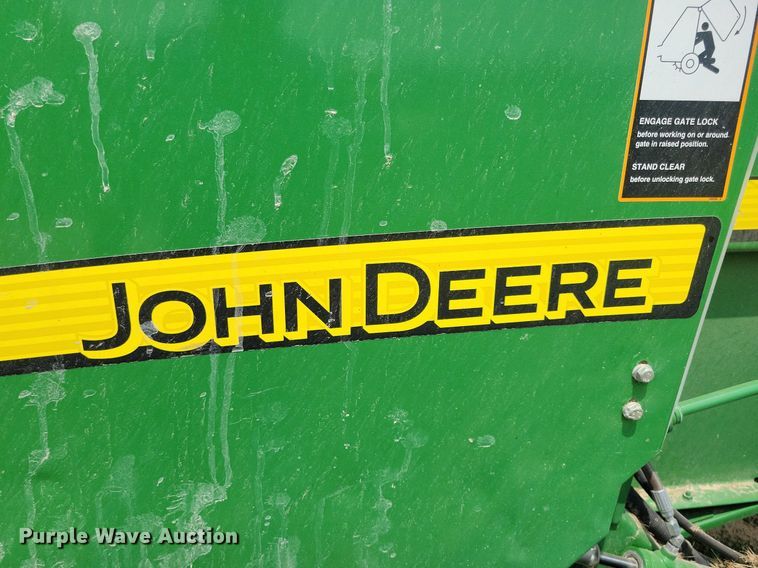 image for item DN4008 John Deere 569 Mega Wide Plus  round baler