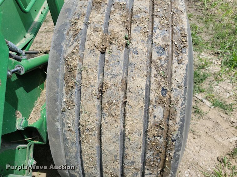 image for item DN4008 John Deere 569 Mega Wide Plus  round baler