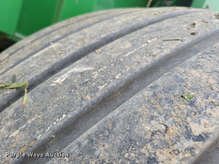 image for item DN4008 John Deere 569 Mega Wide Plus  round baler