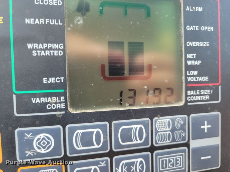 image for item DN4008 John Deere 569 Mega Wide Plus  round baler