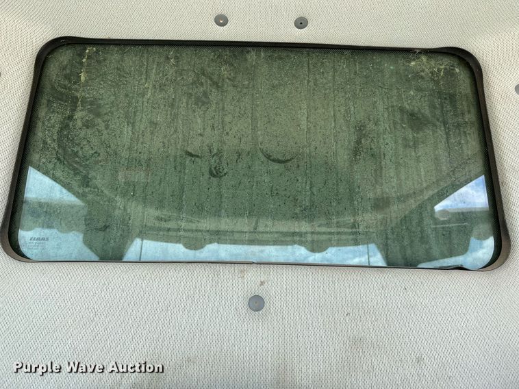 image for item DQ2118 2012 Claas 750  combine