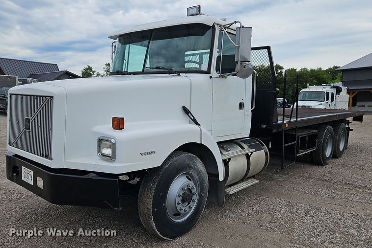 image for item LM9053 1996 Volvo WG  rollback truck