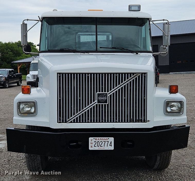 image for item LM9053 1996 Volvo WG  rollback truck