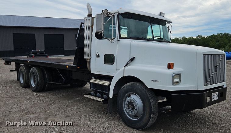 image for item LM9053 1996 Volvo WG  rollback truck