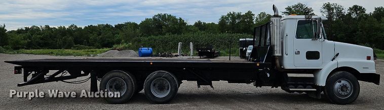 image for item LM9053 1996 Volvo WG  rollback truck