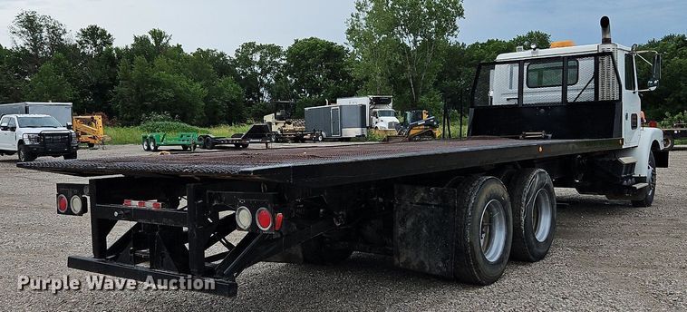 image for item LM9053 1996 Volvo WG  rollback truck