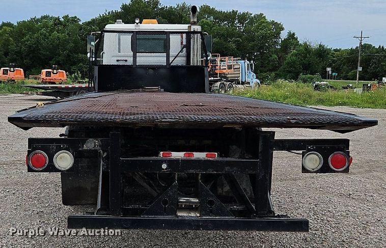 image for item LM9053 1996 Volvo WG  rollback truck