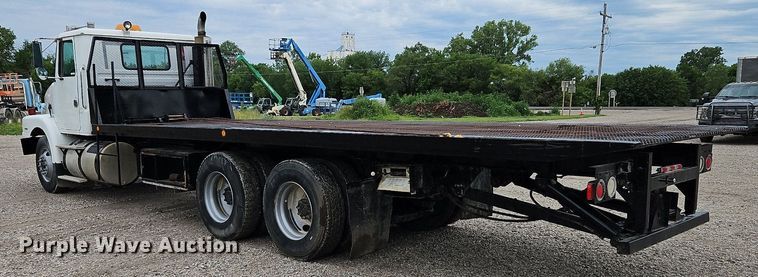 image for item LM9053 1996 Volvo WG  rollback truck