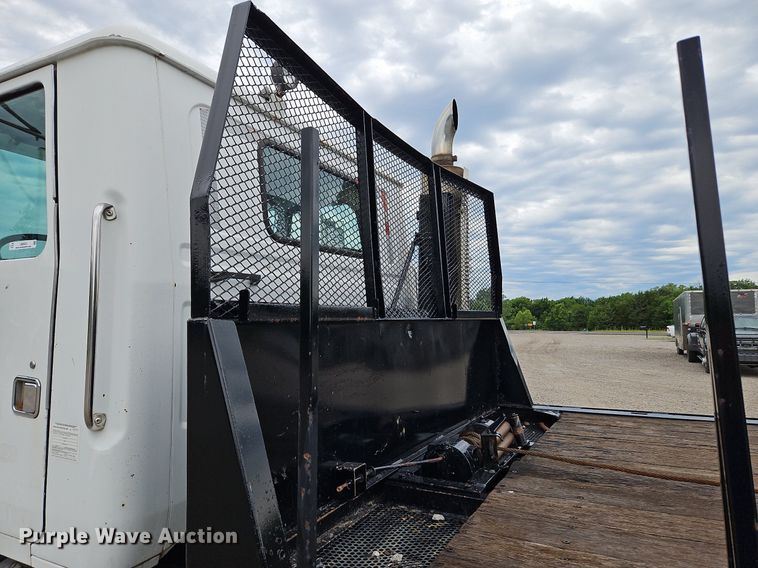 image for item LM9053 1996 Volvo WG  rollback truck