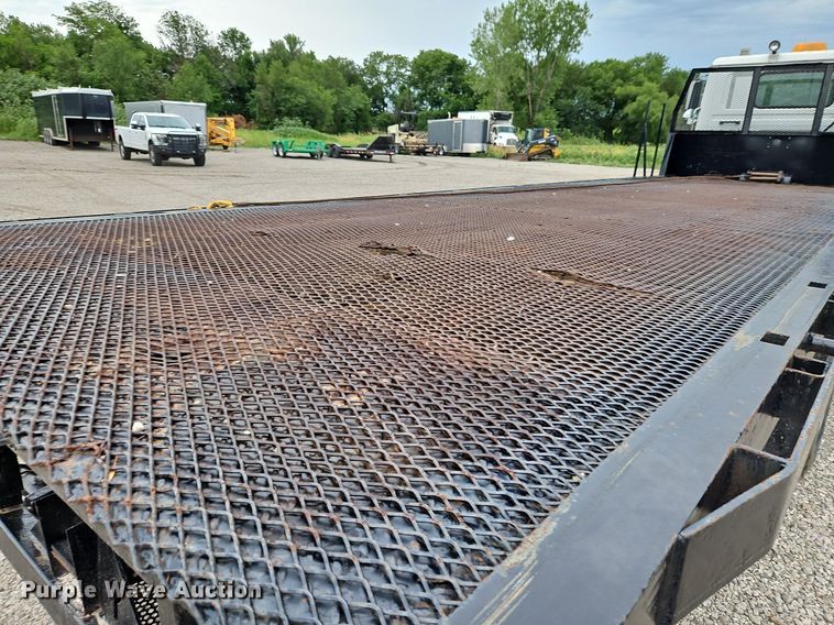 image for item LM9053 1996 Volvo WG  rollback truck