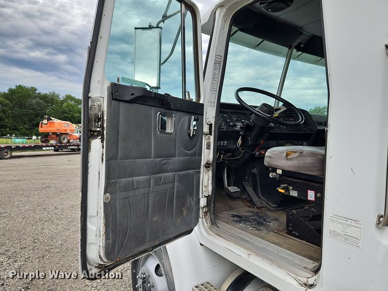 image for item LM9053 1996 Volvo WG  rollback truck