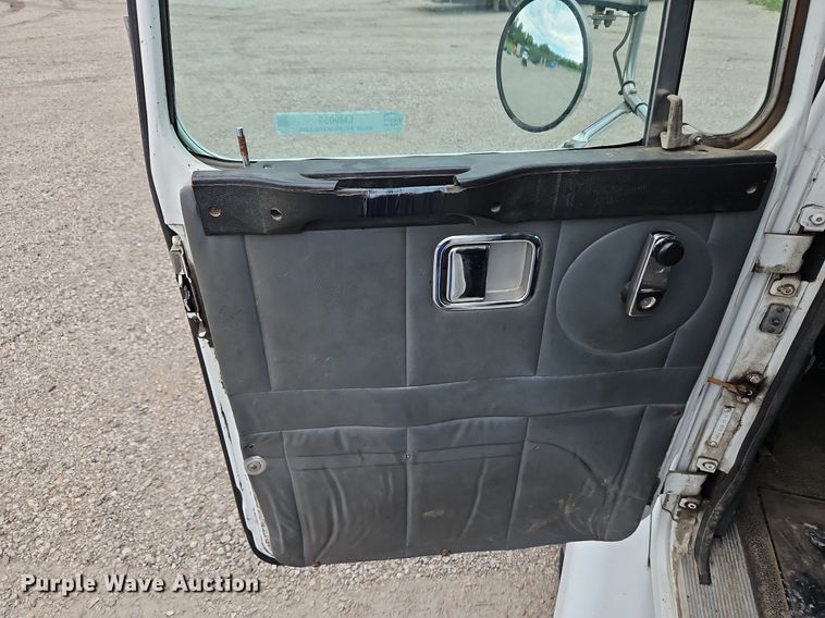 image for item LM9053 1996 Volvo WG  rollback truck