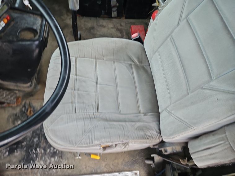 image for item LM9053 1996 Volvo WG  rollback truck