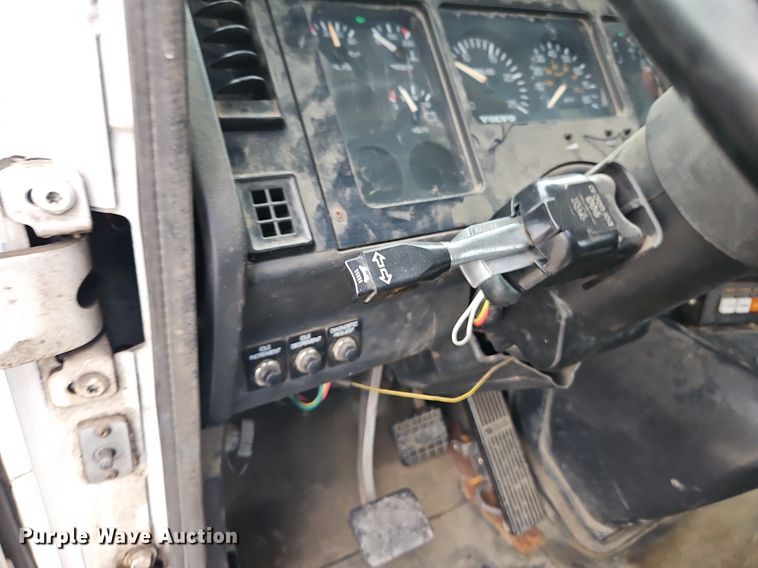 image for item LM9053 1996 Volvo WG  rollback truck