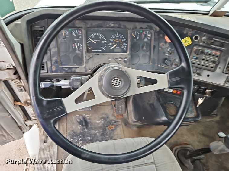 image for item LM9053 1996 Volvo WG  rollback truck