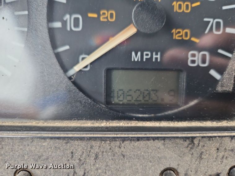 image for item LM9053 1996 Volvo WG  rollback truck