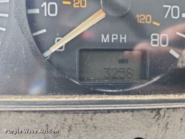 image for item LM9053 1996 Volvo WG  rollback truck