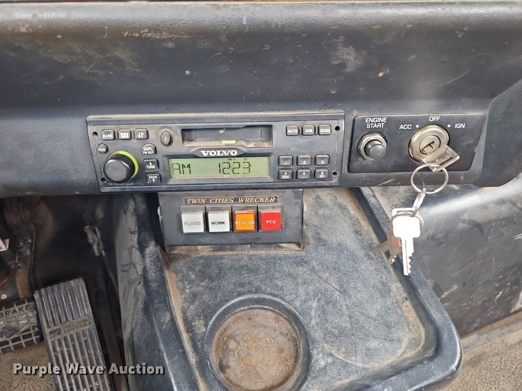 image for item LM9053 1996 Volvo WG  rollback truck