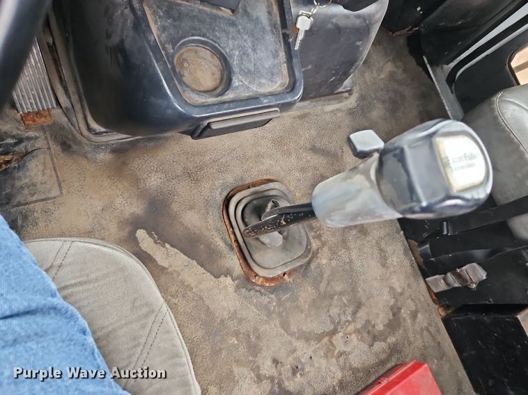 image for item LM9053 1996 Volvo WG  rollback truck