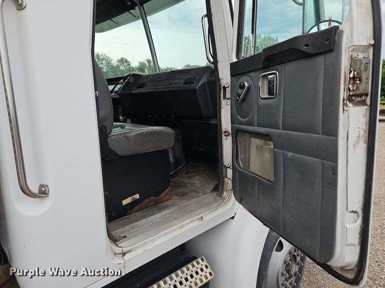 image for item LM9053 1996 Volvo WG  rollback truck