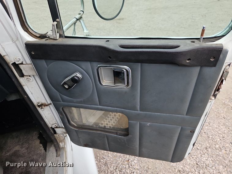 image for item LM9053 1996 Volvo WG  rollback truck