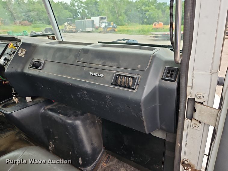 image for item LM9053 1996 Volvo WG  rollback truck