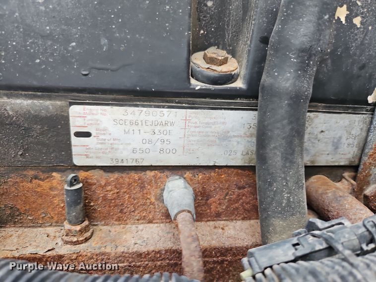 image for item LM9053 1996 Volvo WG  rollback truck