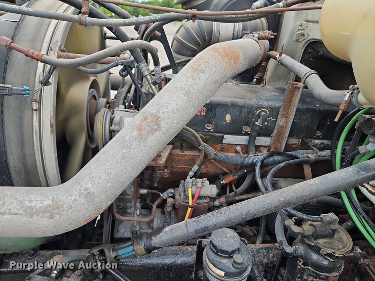 image for item LM9053 1996 Volvo WG  rollback truck