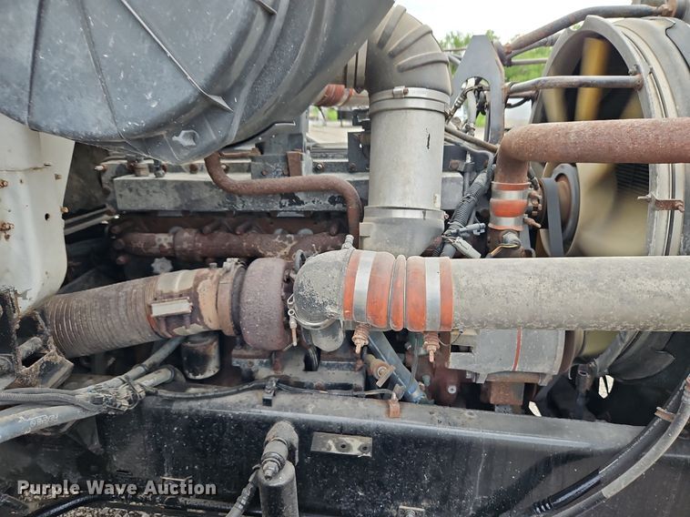 image for item LM9053 1996 Volvo WG  rollback truck