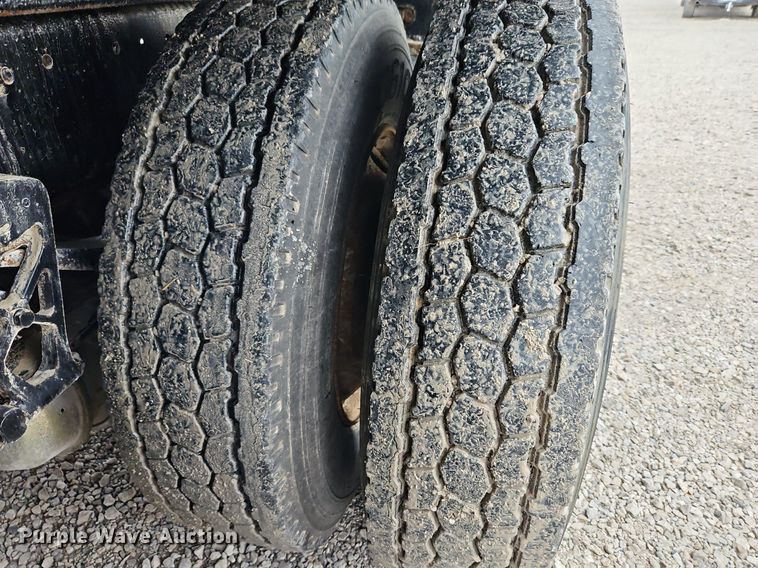 image for item LM9053 1996 Volvo WG  rollback truck