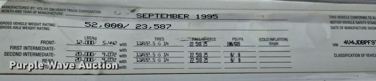 image for item LM9053 1996 Volvo WG  rollback truck