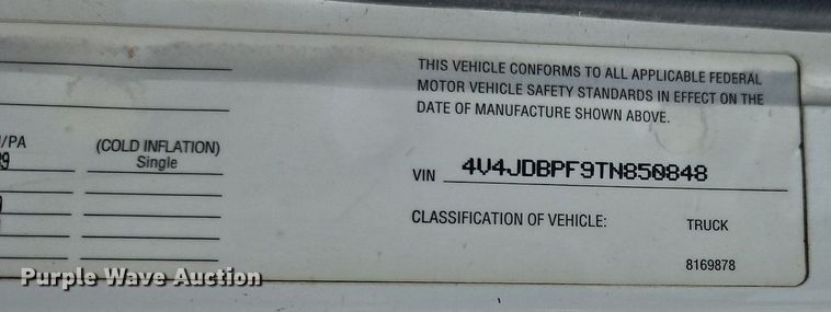 image for item LM9053 1996 Volvo WG  rollback truck