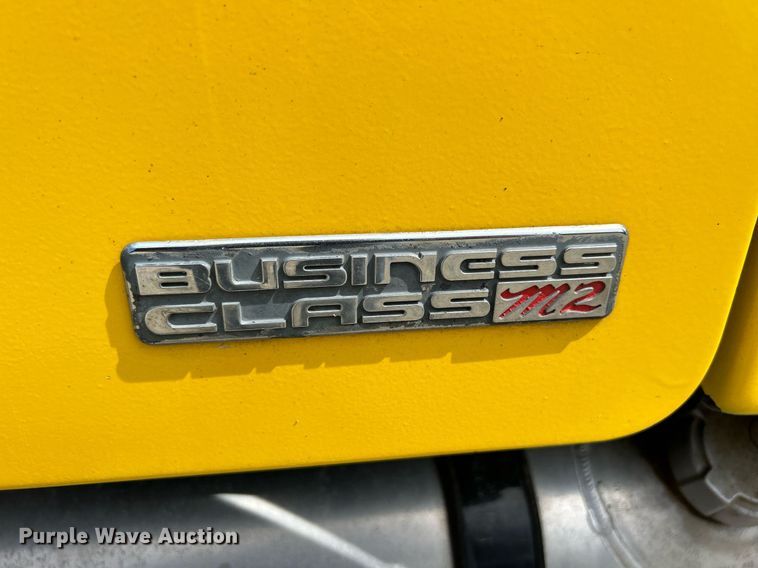 image for item MD9000 2006 Freightliner Business Class M2 106  rollback truck